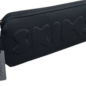 Tons of SKIMS travel bags